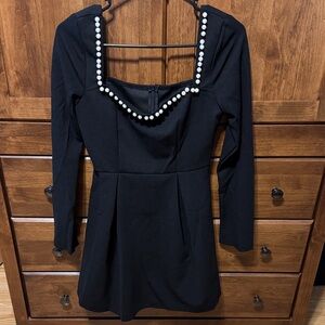 Elegant Black Dress with Pearl Accents